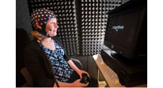 person taking cognitive test on computer
