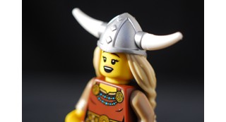 Lego figure of an opera singer posed as though singing an aria